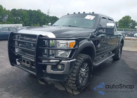2012 Ford F-250 Lariat из США, поврежденный, VIN 1FT7W2BT4CED04407